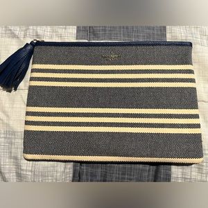 Kate Spade cream and navy stripe clutch with tassel